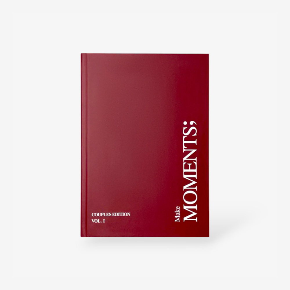 Book titled 'Make Moments Couples Edition Volume 1' on a white background